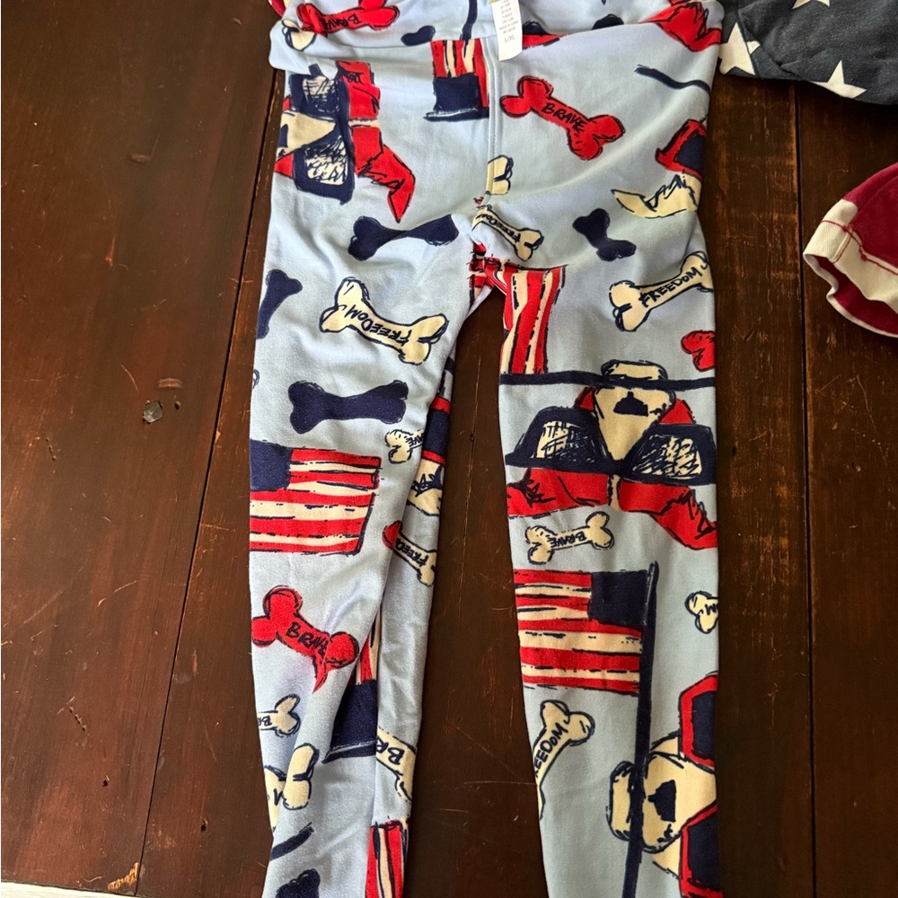 LuLaRoe Light Blue Leggings with Red, Navy & Cream Paw and Flag Print